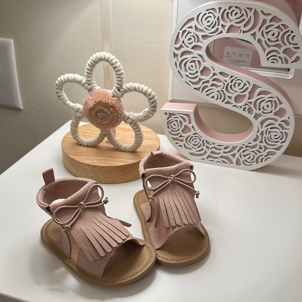 Pink moccasin sandals
